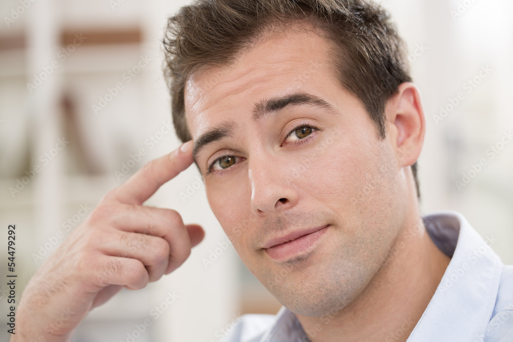 Obraz premium Interior portrait of looking relaxed happy male