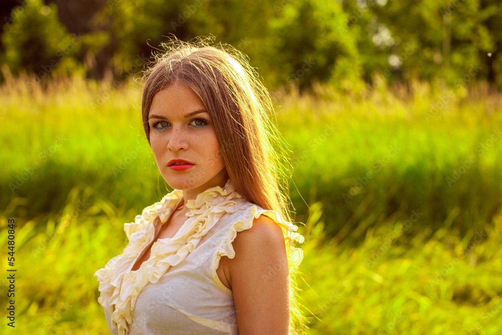Portrait of young beautiful woman in park Portrait of young beautiful woman in park