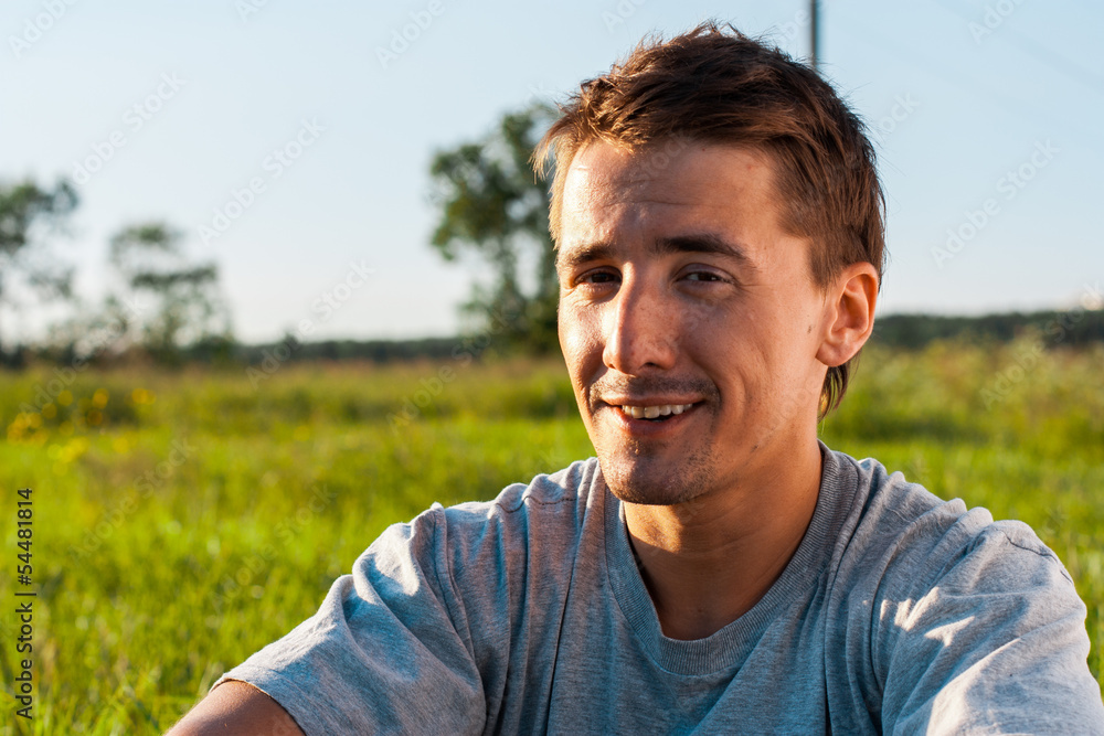 Handsome man in the park. Funny shot Handsome man in the park. Funny shot