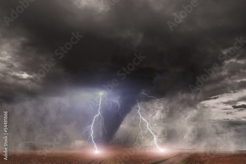 Tornado with lightning over a field