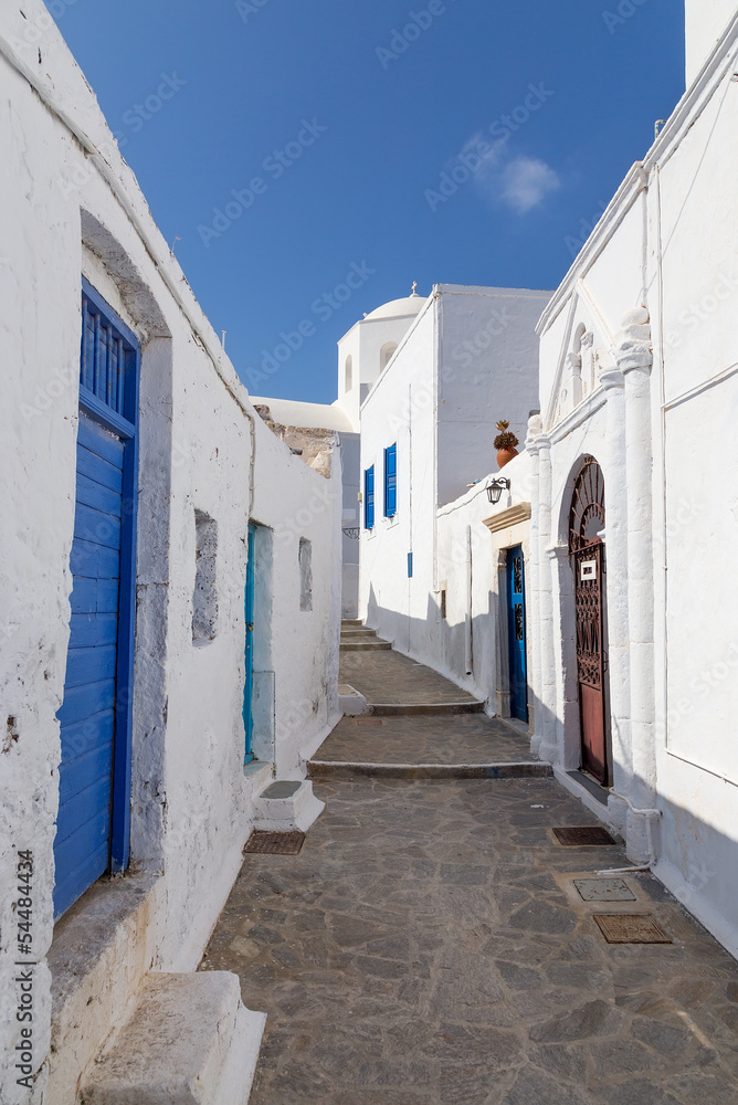 Picturesque alley in Plaka village, Milos island, Greece