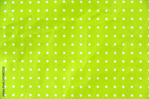 lime green paper with white dots