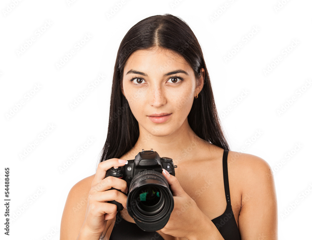 Closeup portrait of a young woman holding a camera over white
