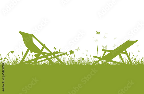 Grüner Liegestuhl auf Wiese