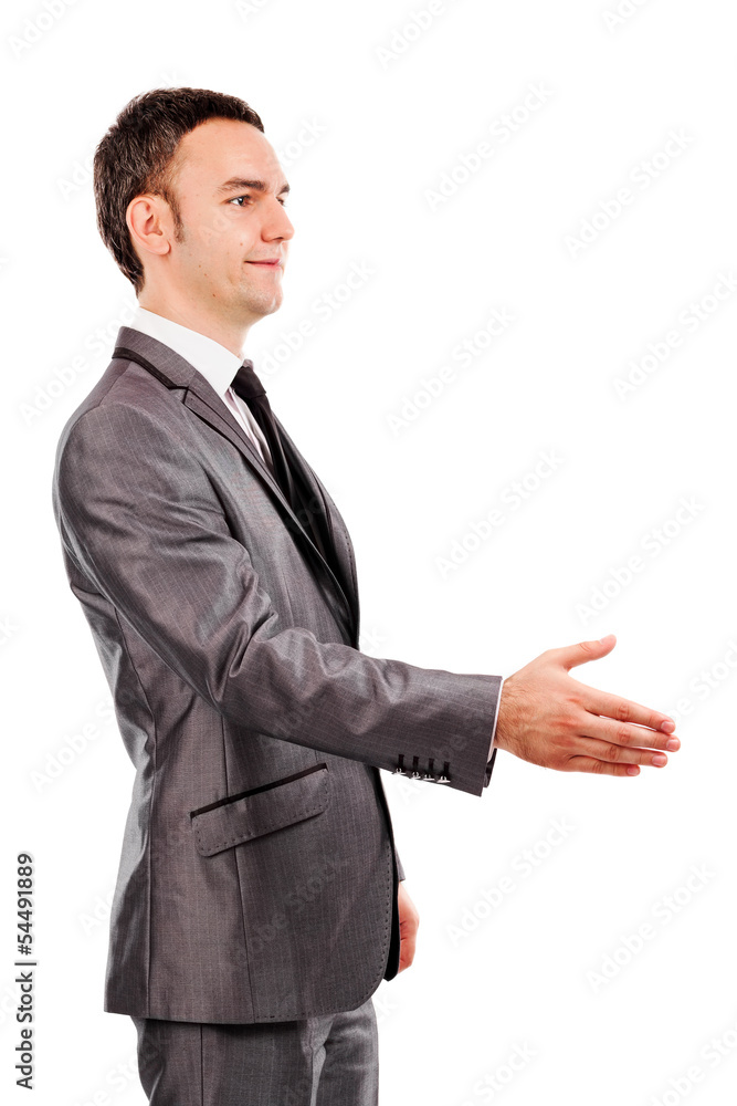 Young businessman with an open hand ready to seal a deal Young businessman with an open hand ready to seal a deal