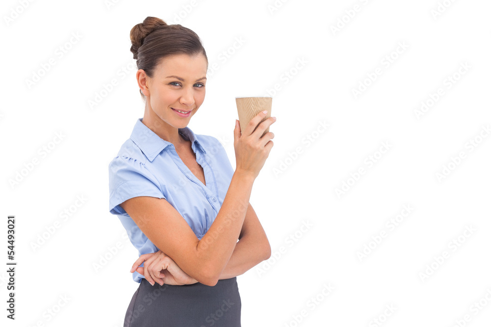 Classy businesswoman holding coffee cup Classy businesswoman holding coffee cup