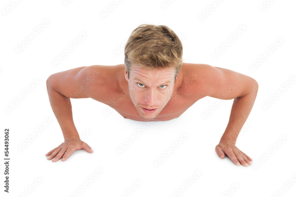 Shirtless man doing push ups Shirtless man doing push ups