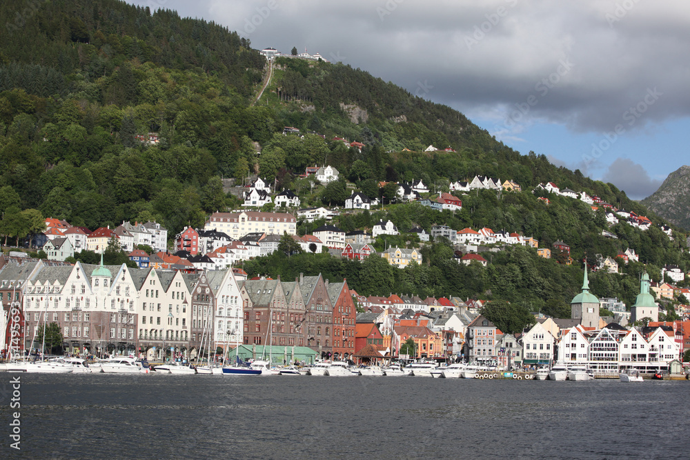 BERGEN, NORWAY - CIRCA JULY 2012: Tourists and locals stroll alo