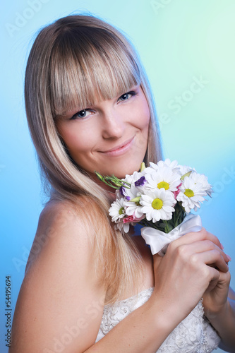 portrait of happy bride with a bouquet