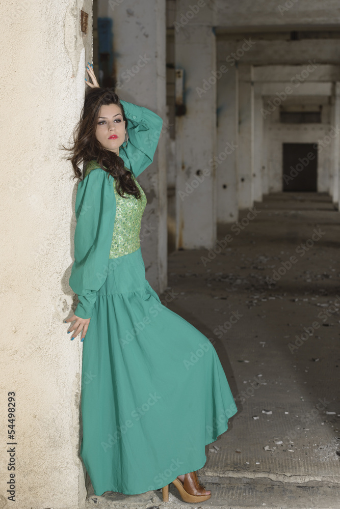 Attractive young lady posing somewhere in industrial ruins Attractive young lady posing somewhere in industrial ruins
