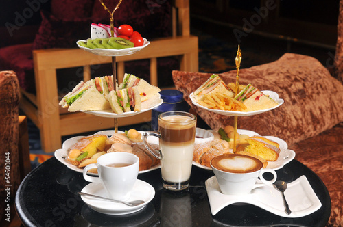 Afternoon tea with sandwiches and coffee