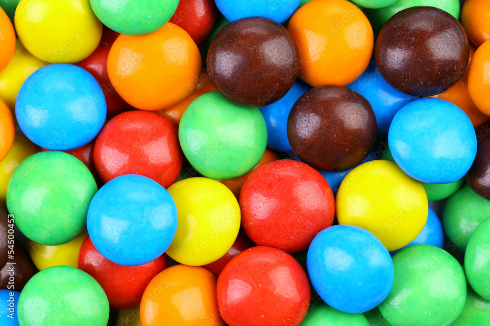 Backgroynd of chocolate balls in colorful glaze. Backgroynd of chocolate balls in colorful glaze.