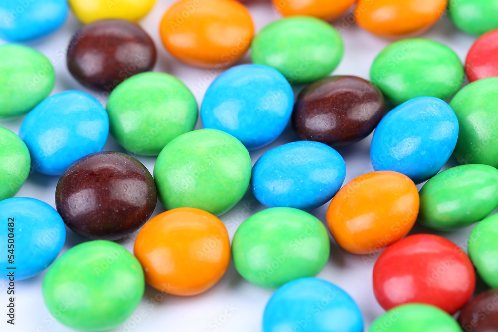 Backgroynd of chocolate balls in colorful glaze. Backgroynd of chocolate balls in colorful glaze.