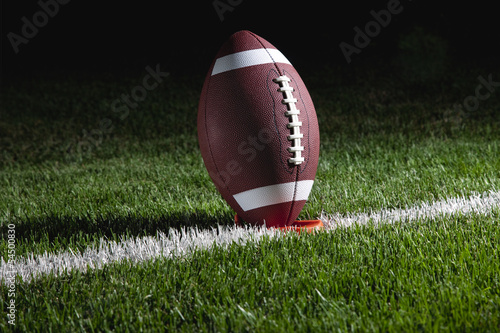College football on a tee at night