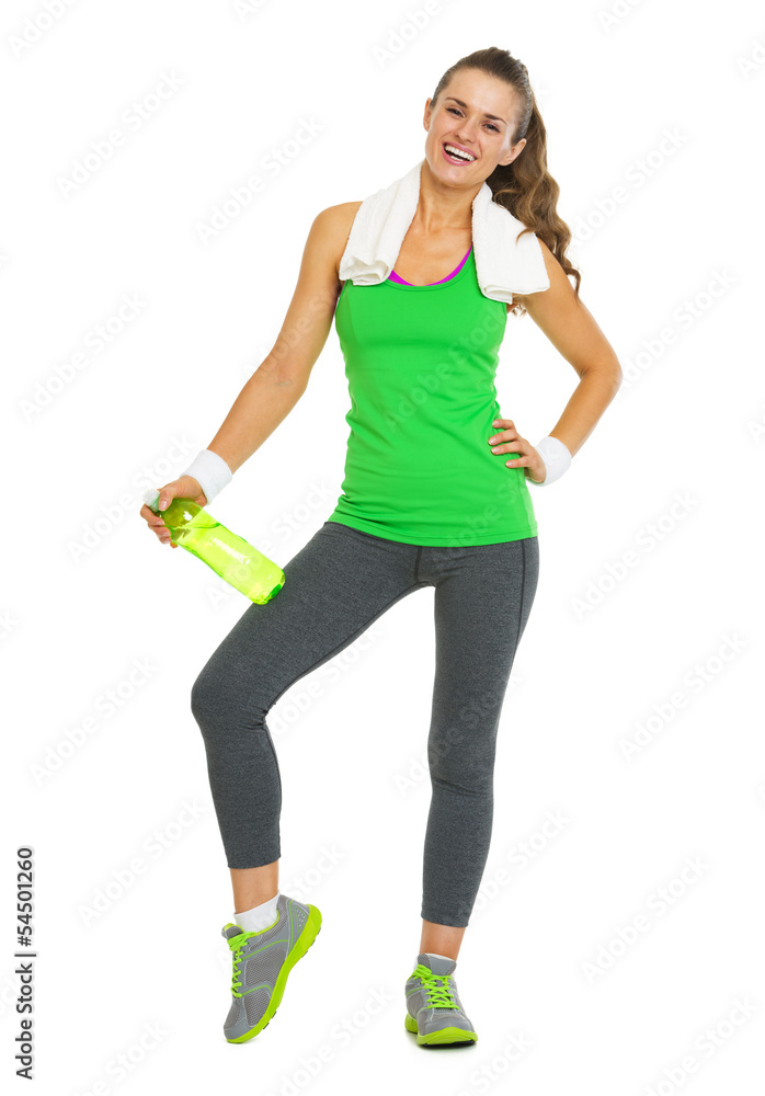 Smiling fitness young woman with bottle of water Smiling fitness young woman with bottle of water