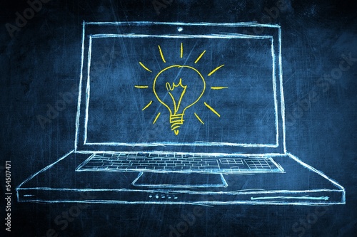 Sketch netbook computer screen concept with idea light bulb