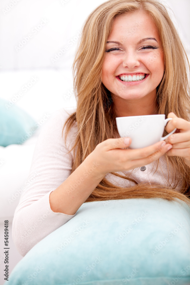 woman with white cup