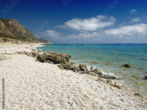 wild beach with rocks in water. Island Lefkada © Željko Radojko
