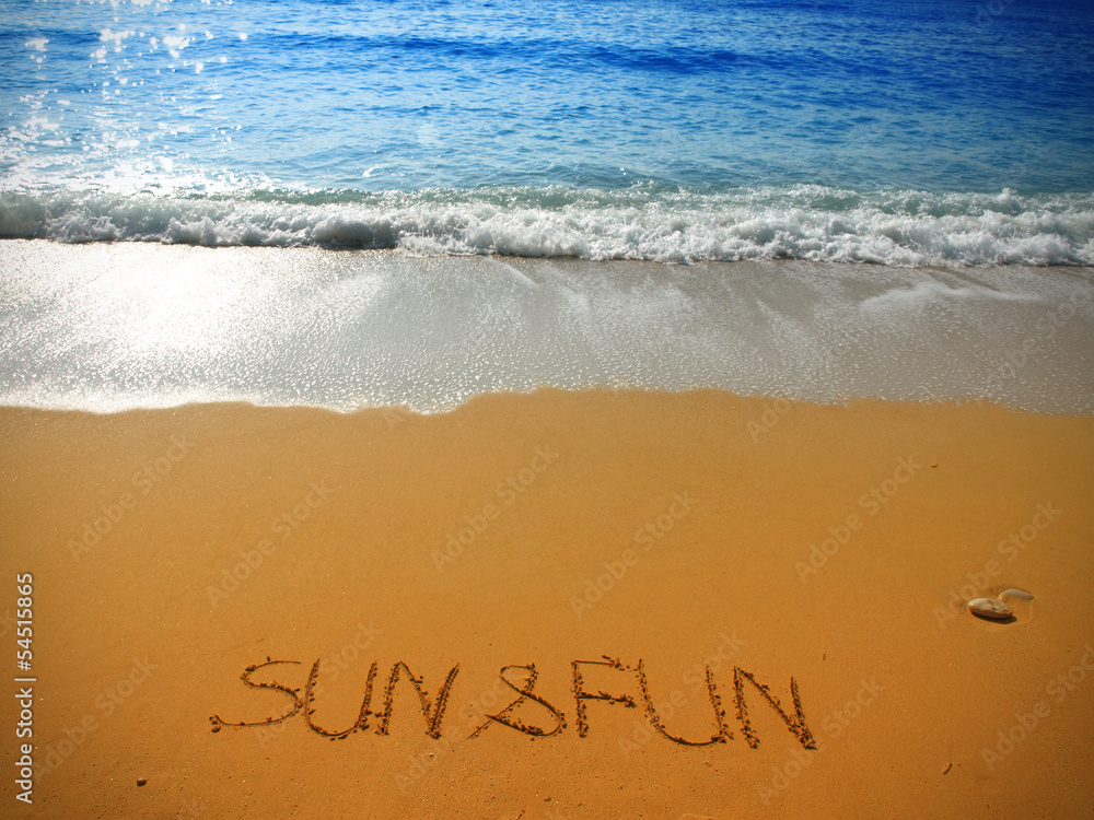 Fototapeta premium beautiful coastline landscape and handwritten text on the sand