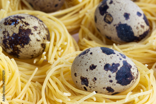 Quail eggs in noodle nests