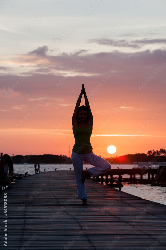 Yoga practise during sunset