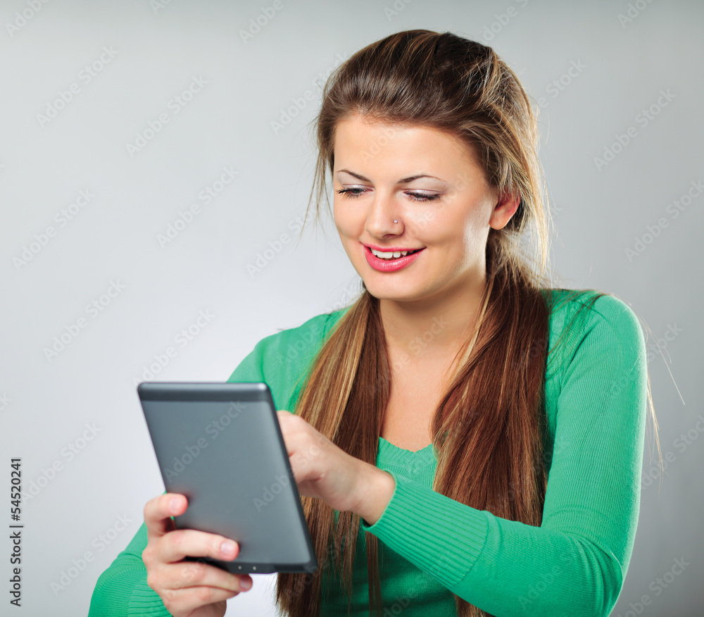 Young woman holding computer plane-table Young woman holding computer plane-table