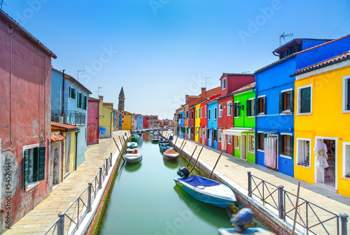 Venice landmark, Burano island canal, houses and boats, Italy © stevanzz