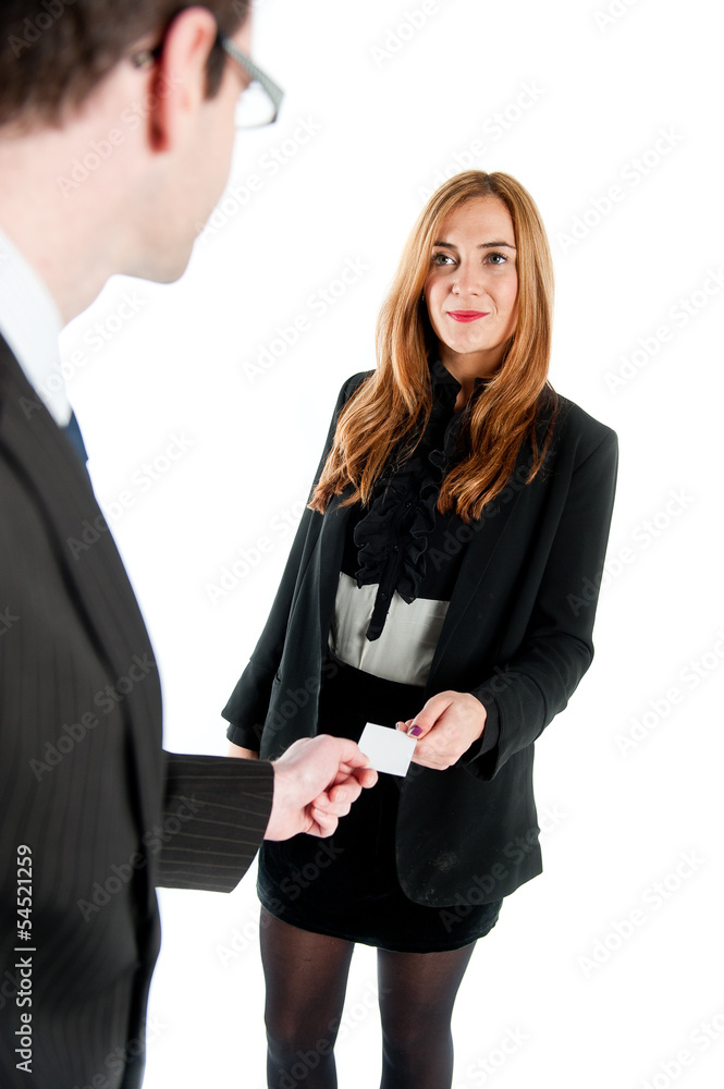 Business workers exchanging business cards Business workers exchanging business cards