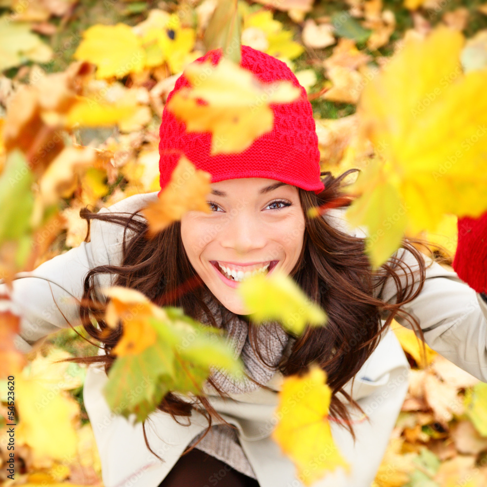 Autumn woman happy with colorful fall leaves Autumn woman happy with colorful fall leaves