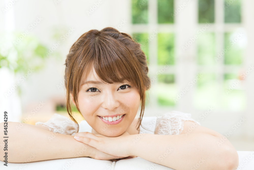 Beautiful young woman relaxing in the room Beautiful young woman relaxing in the room