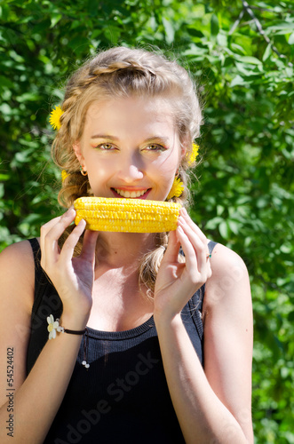 woman eating corn-cob