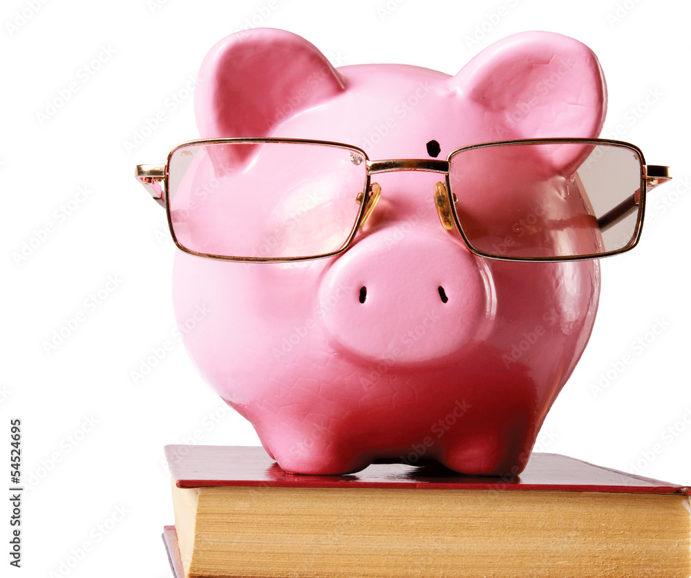 piggy bank with glasses and book isolated white background piggy bank with glasses and book isolated white background