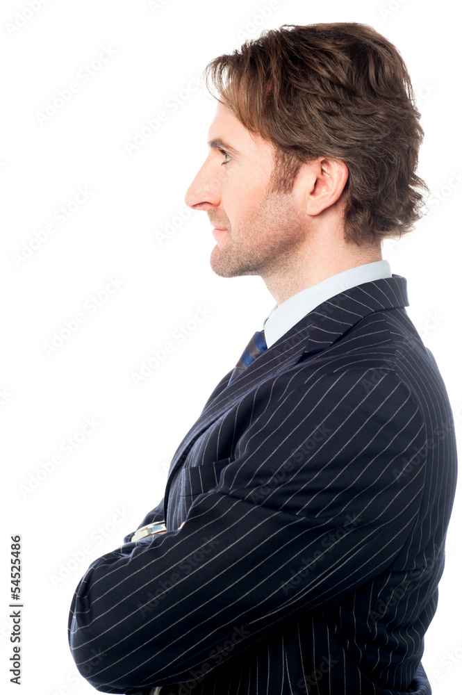 Handsome business professional, side pose Handsome business professional, side pose