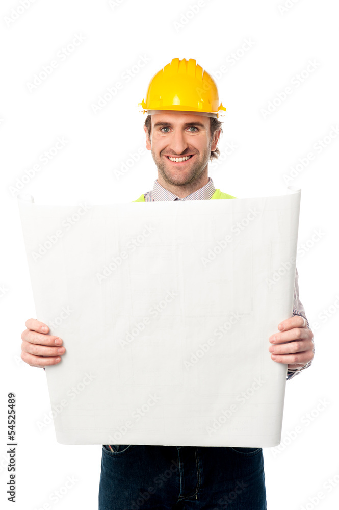 Male construction worker holding blueprint Male construction worker holding blueprint