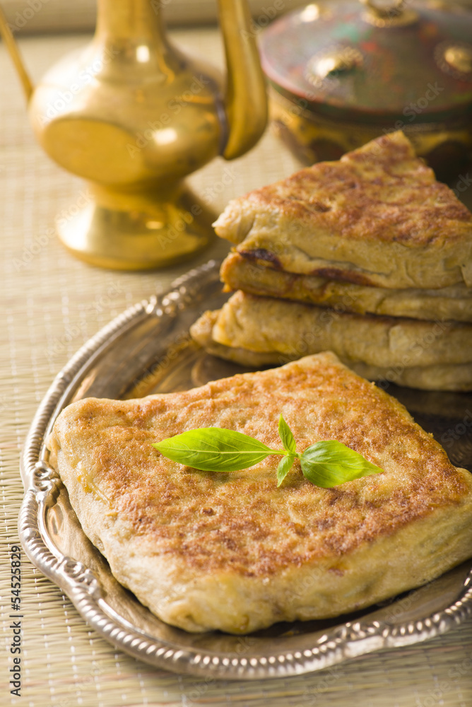 mutabbaq a popular arab food where bread if stuffed with meat mutabbaq a popular arab food where bread if stuffed with meat