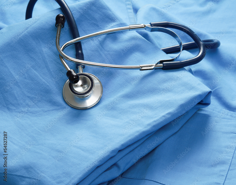 A stethoscope on a medical uniform, closeup A stethoscope on a medical uniform, closeup