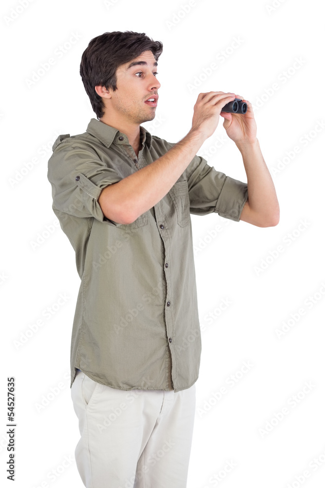 Surprised man holding binoculars Surprised man holding binoculars