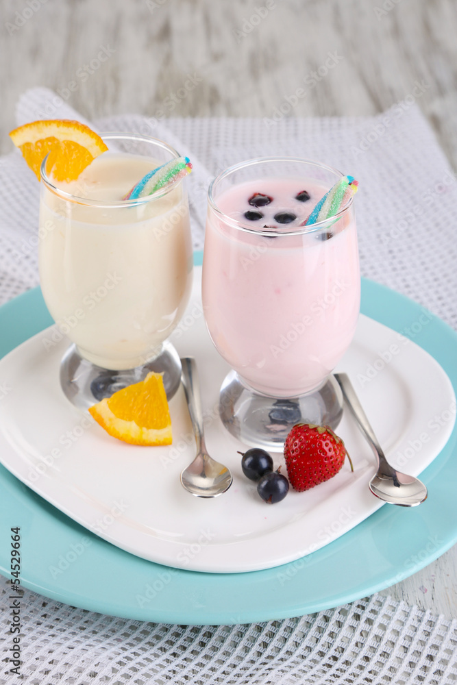 Delicious milk shakes with orange and blackberry Delicious milk shakes with orange and blackberry
