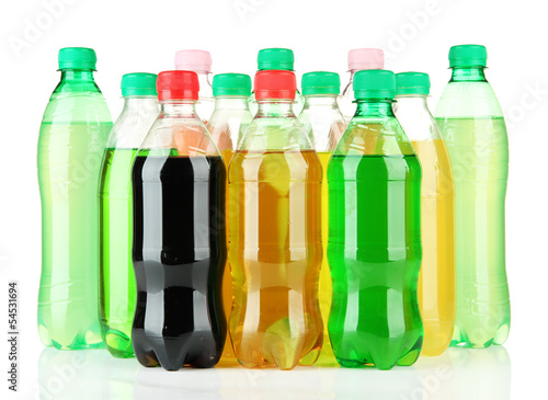 Bottles with tasty drinks, isolated on white