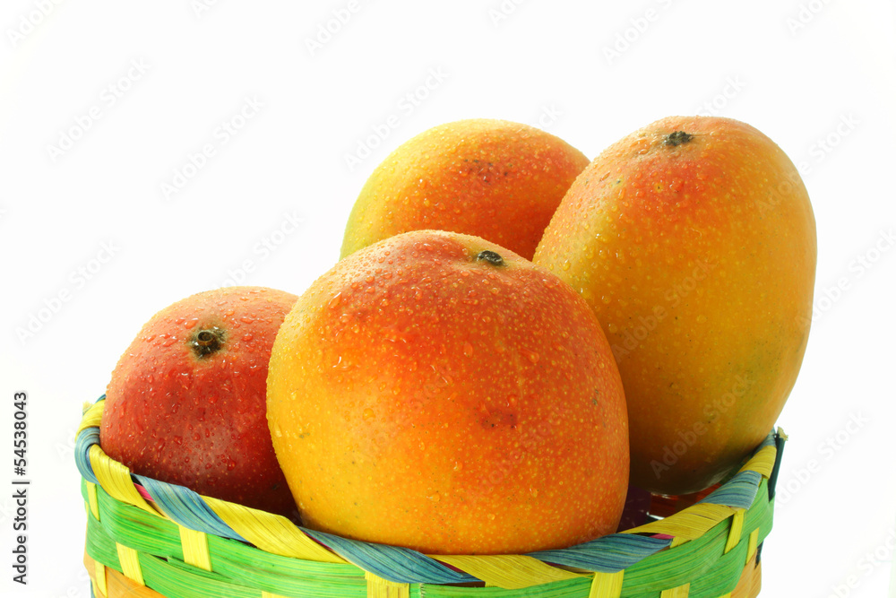 mango in basket with water drops mango in basket with water drops