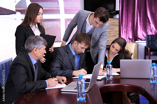 Business people working in ...