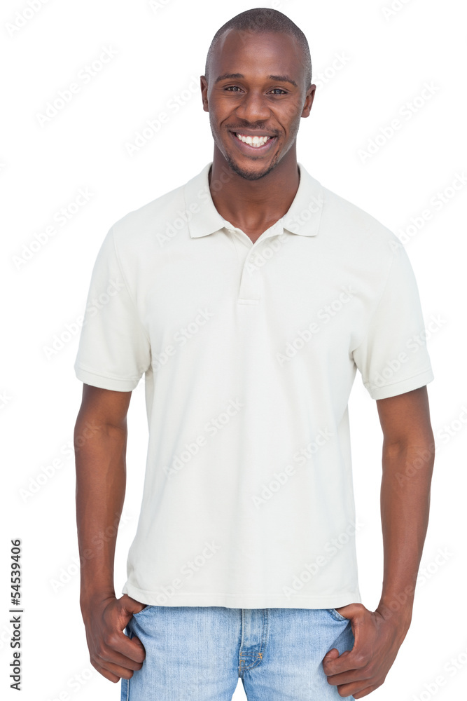 Smiling man with thumbs in pocket Smiling man with thumbs in pocket
