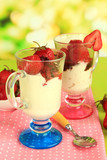 Delicious strawberry desserts in glass vase
