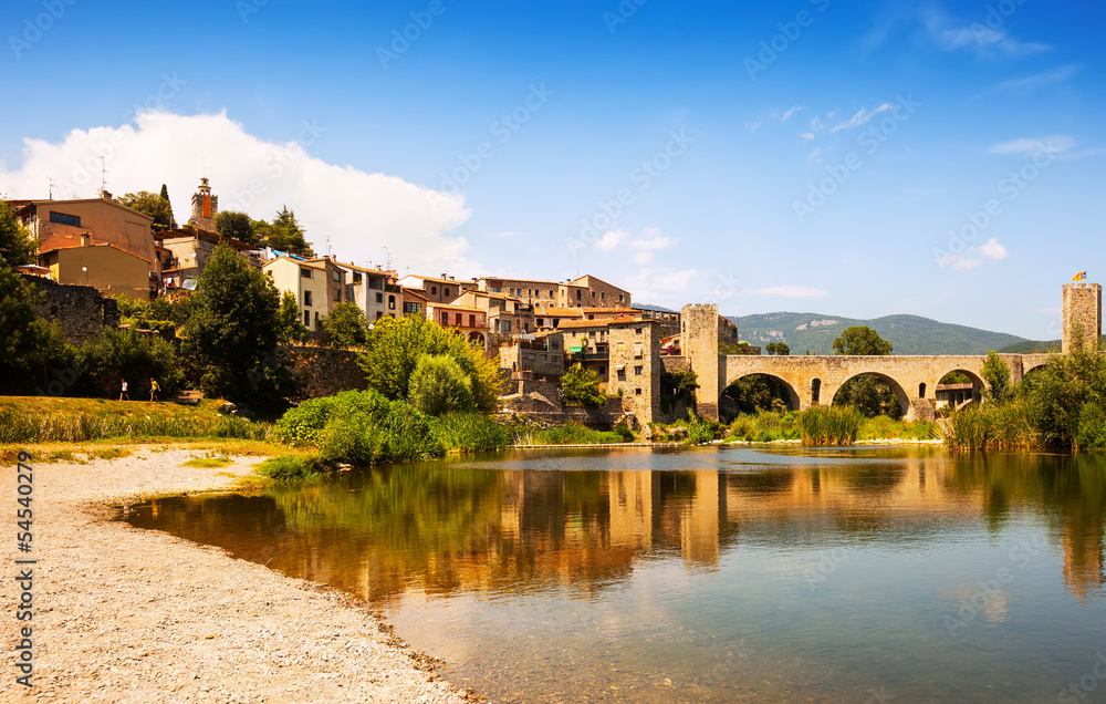 Old  town with antique bridge over  river. Besalu