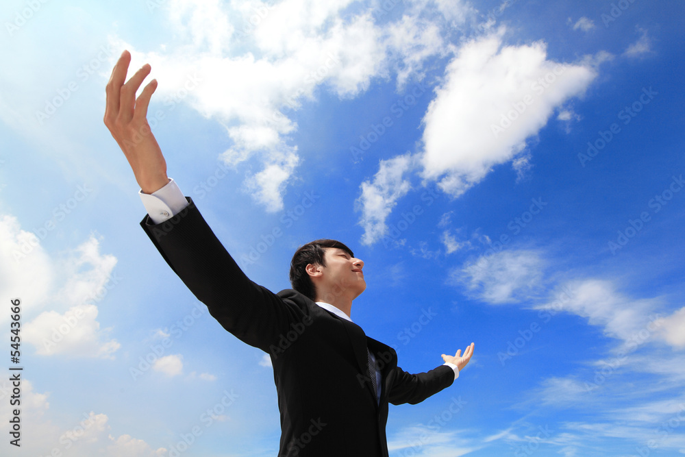 Business man carefree outstretched arms Business man carefree outstretched arms