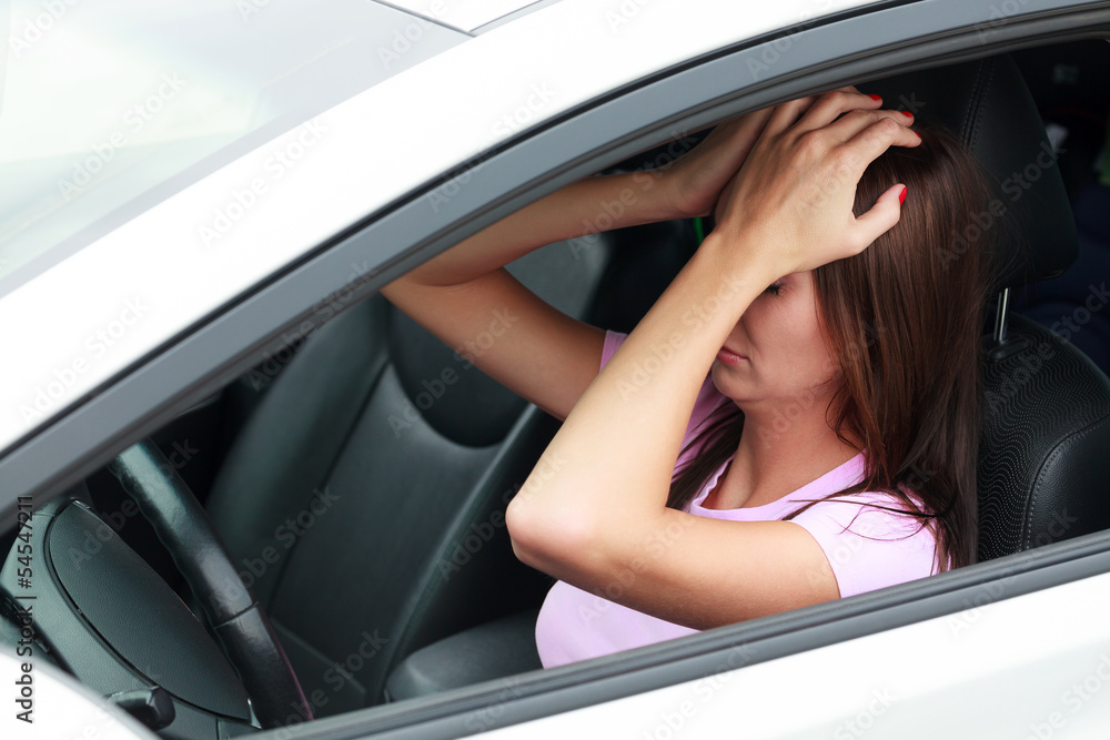 Sad woman in a car Sad woman in a car