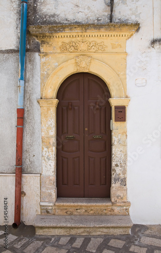 Wooden door. Ceglie Messapica. Puglia. Italy. © Mi.Ti.