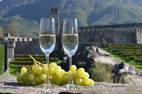 Pair of champagne glasses and grapes. Bellinzona, Switzerland