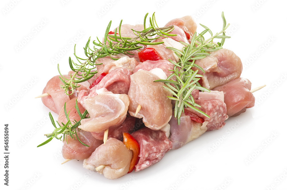 chicken skewers and rosemary close up on white chicken skewers and rosemary close up on white