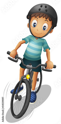A boy biking wearing a helmet